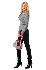 Image showing Smiling pretty blonde with a handbag