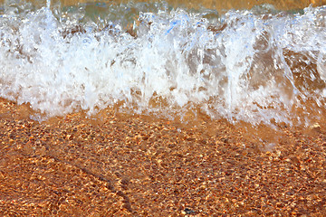 Image showing sea waves and gold sand close-up