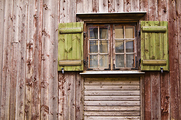 Image showing Old wooden window with shutters