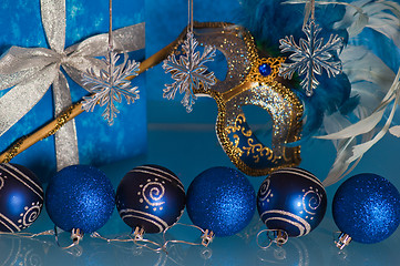 Image showing  New Year's and Christmas ornaments and a carnival a mask