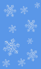 Image showing  Falling snowflakes on a blue background