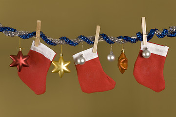 Image showing red hanging socks, Christmas symbol