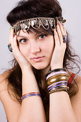 Image showing brunette lady with bracelets