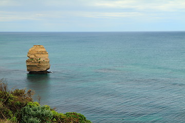 Image showing Rock formation in tranquil sea
