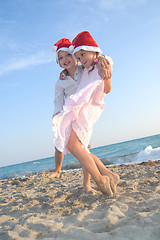 Image showing Santa kids at the summer beach