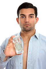 Image showing Man with perfume cologne cosmetic