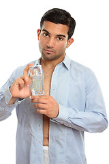 Image showing Man showing perfume cologne fragrance