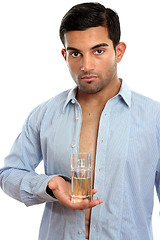 Image showing Man holding perfume fragrance