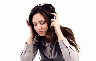 Image showing Young girl in headphones  