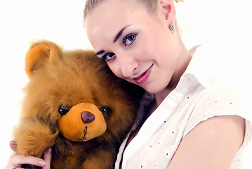 Image showing Young woman with teddy bear  