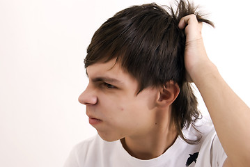 Image showing Young  guy thinking      