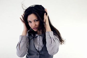 Image showing Young girl in headphones   