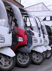 Image showing Scooters in a row