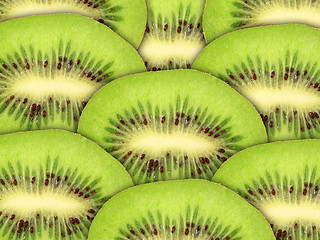 Image showing Abstract green background with raw kiwi slices