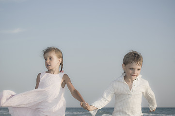 Image showing happy kids running