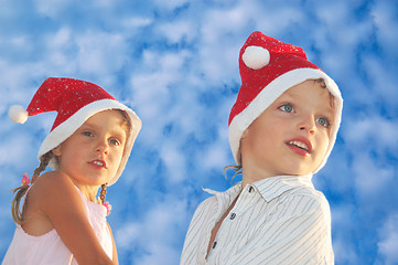 Image showing Christmas children agaist the blue sky