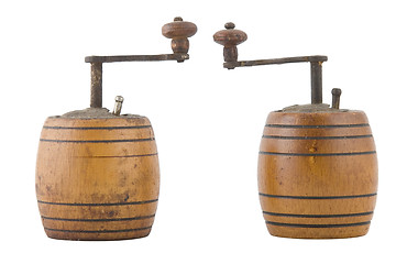 Image showing two vintage brown grinder, wooden made