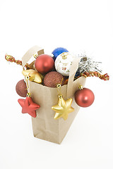 Image showing Christmas items in shopping  bag