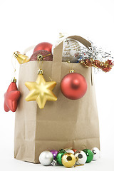 Image showing Christmas items in shopping  bag