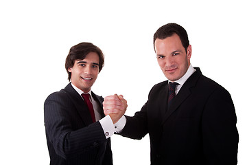 Image showing handshake between two businessmen smilling