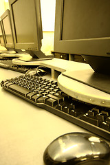 Image showing workplace room with computers in row 