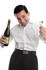 Image showing Happy man with bottle of champagne