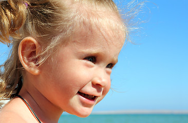 Image showing happy little girl on beach