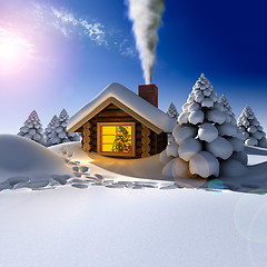 Image showing A small wooden house in a fantastic snow forest on the eve of Ne