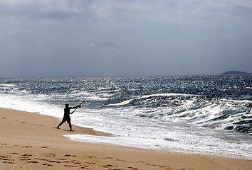 Image showing Fishing on the beach