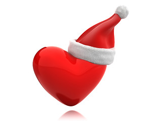 Image showing Red shiny heart with santa hat isolated