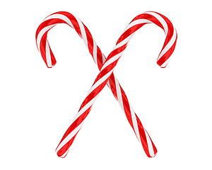 Image showing Two crossed christmas candies isolated