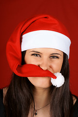 Image showing Funny Santa Claus girl