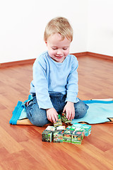 Image showing Lovely boy playing with blocks