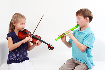 Image showing Kids playing flute and violin
