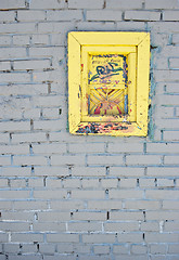 Image showing White brick wall with old window