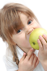 Image showing girl biting an apple