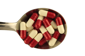 Image showing Spoon with pills