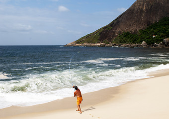 Image showing Fishing on the beach