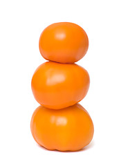 Image showing Three orange tomato.