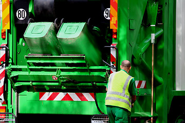 Image showing Garbage truck and worker