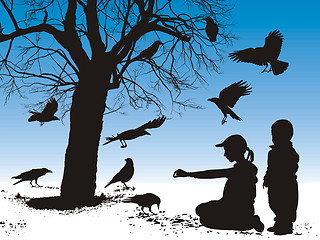 Image showing Children fed birds