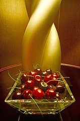 Image showing Interior design element (faux cherries) in front of a lamp in an upscale hotel suite in Las Vegas (Mandalay Bay). They looked so real, I reached for one! (macro,14MP camera)