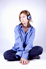 Image showing Young girl in headphones   