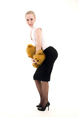 Image showing Young woman with teddy bear  