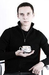 Image showing young man with a cup of tea 