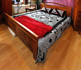 Image showing Wooden bed