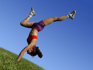 Image showing Girl exercising outdoors