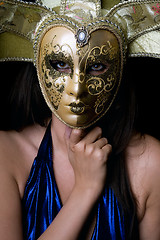 Image showing Portrait of young woman in a Venetian mask