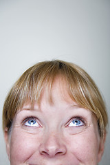 Image showing Woman Looking Up