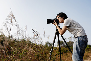 Image showing Photographer taking photo